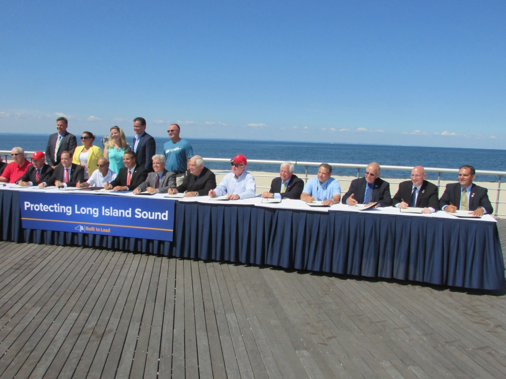 Assemblyman Dave McDonough (R,C,I-Merrick), pictured third from right, joins Governor Cuomo, state and federal representatives and environmental activists to pen a letter to President Obama threatenin