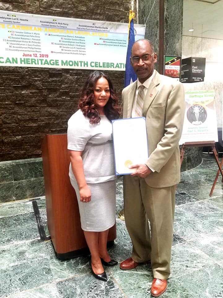 Congratulating Dr. Jean Joseph, President of WADICA.