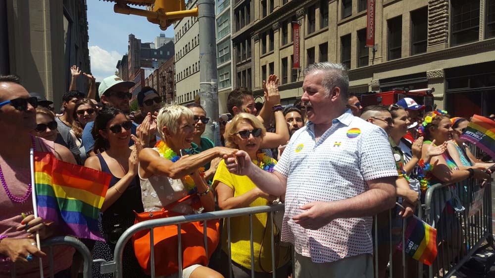 Assemblymember O'Donnell engages with the crowd at the 2016 NYC Pride Parade.