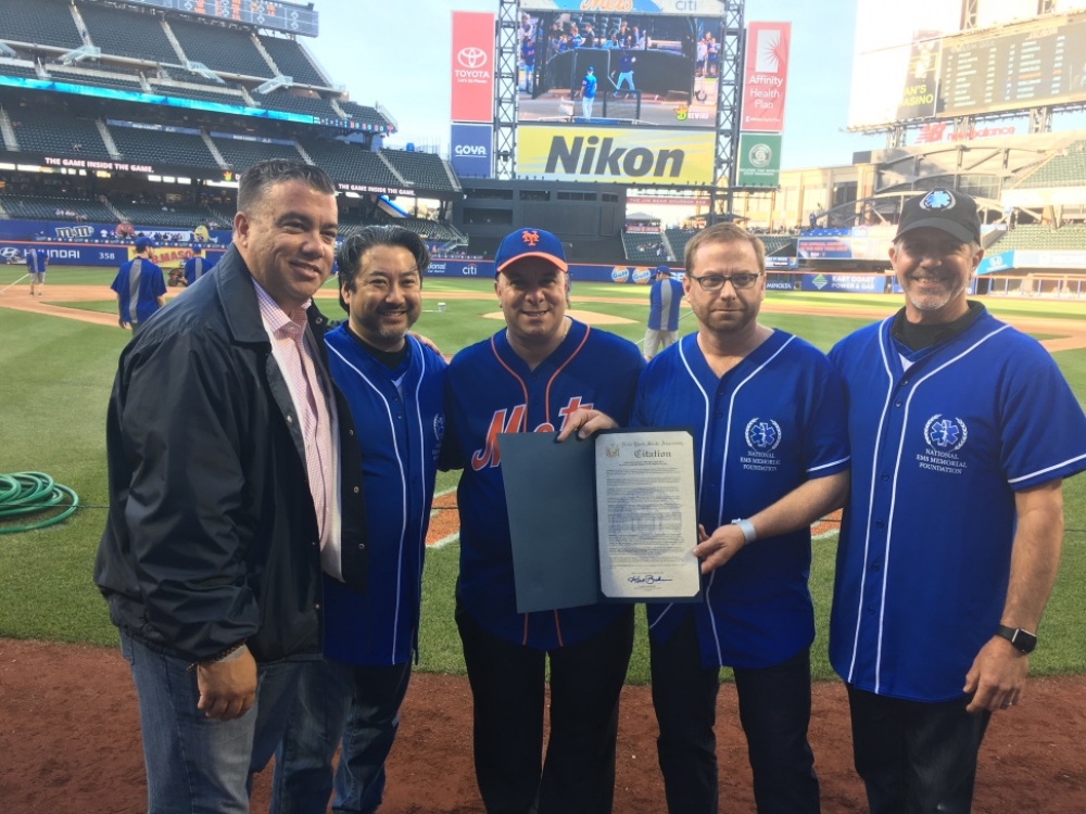Assemblyman Karl Brabenec [center] joins EMS units from across the country at Citi Field to commemorate EMS Week in New York State