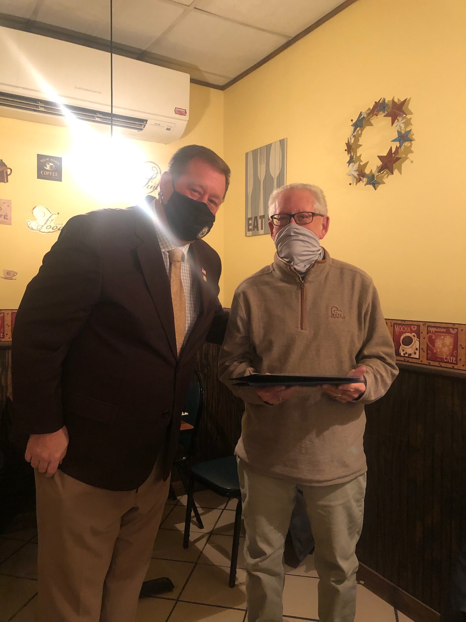 Assemblyman Chris Tague (R,C,I,Ref-Schoharie) presents Perry Kane with an Assembly Citation as well as recognitions from the New York State Senate and United States House of Representatives on behalf