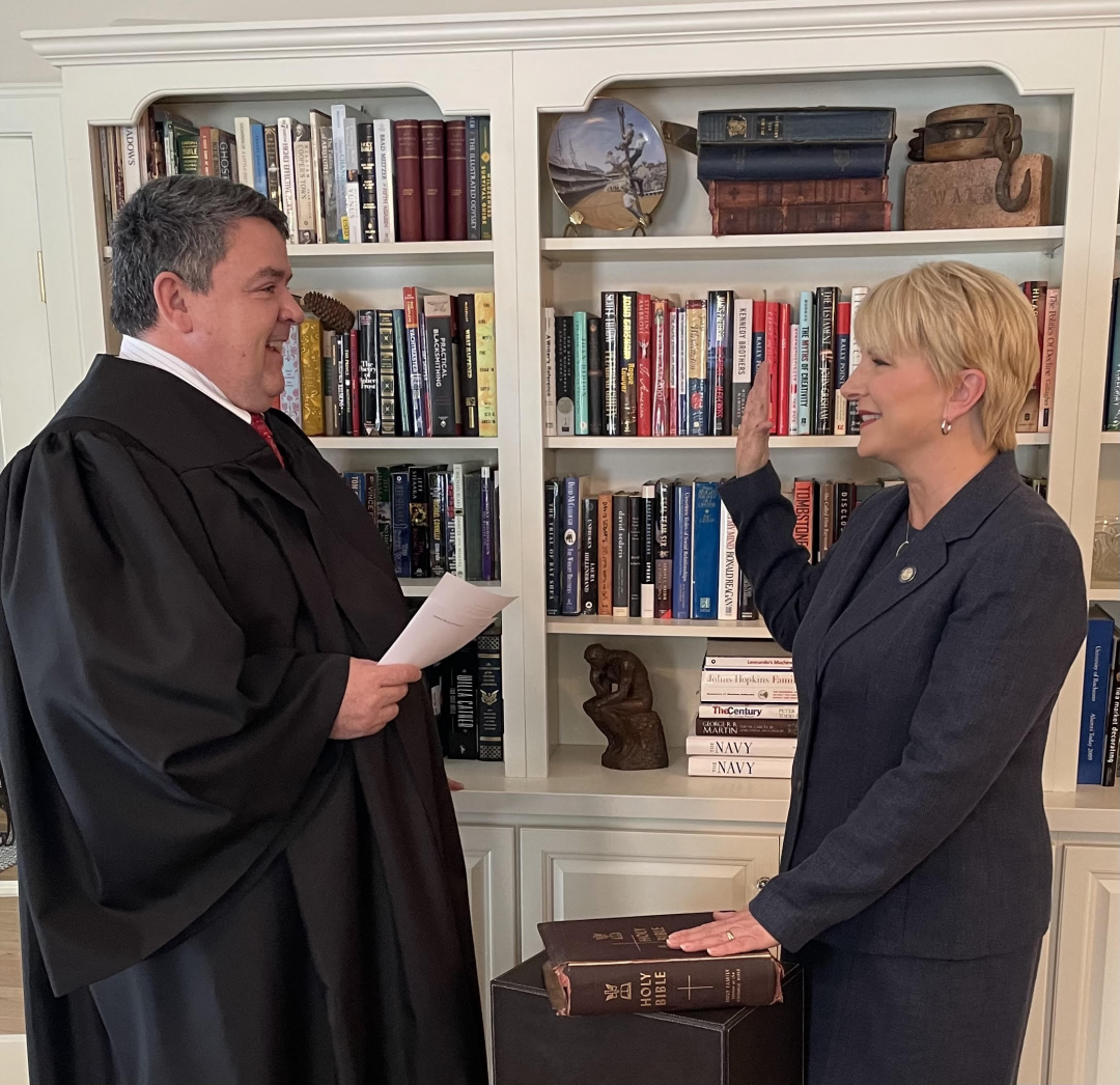 Assemblywoman Mary Beth Walsh (R,C,I-Ballston) pictured with husband, Supreme Court Justice James E. Walsh as she gets sworn in for her third term as assemblywoman.