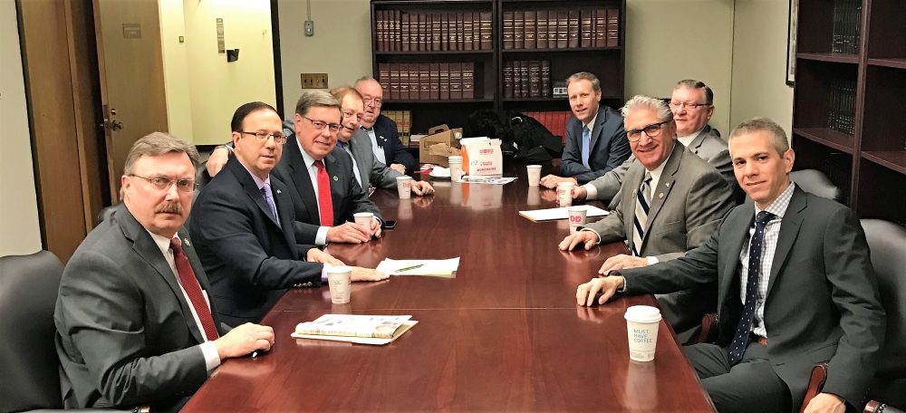 The Mohawk Valley Nine hold their initial caucus meeting at the Capitol in Albany.  Left side of table from front, Assemblyman Miller, Senator Griffo, Senator Seward, Assemblyman Butler, Assemblyman M