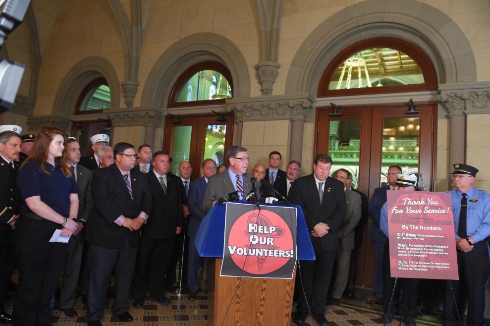 Assemblyman Robert Smullen (R,C,Ref-Meco) joins fellow legislators and volunteer firefighters at the NYS Assembly Chamber on Monday 5/20 to advocate for a volunteer firefighter’s state income tax