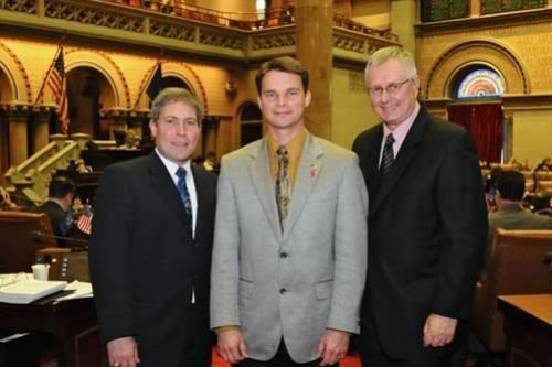 Pictured, left to right, Jay Dinga, Assemblyman Chris Friend, Thomas Osiecki