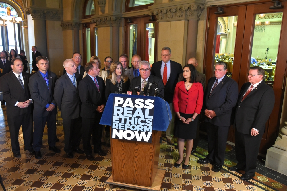 Assemblyman Christopher S. Friend (R,C,I-Big Flats) (second left) and Assembly Minority colleagues at a recent press conference calling for passage of real ethics reform.