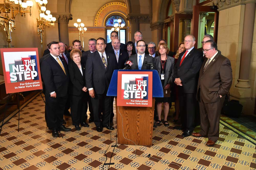 Assemblyman Christopher S. Friend (R,C,I-Big Flats), along with his Assembly Minority colleagues, looks on as Assemblyman Ed Ra begins recent press conference in Albany to announce their new education