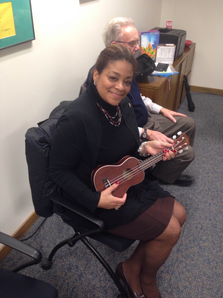 During a visit to the Liverpool Library, Assemblymember Pamela Hunter learned that not only can you borrow books from the library but the loan out musical instruments like this ukulele.
