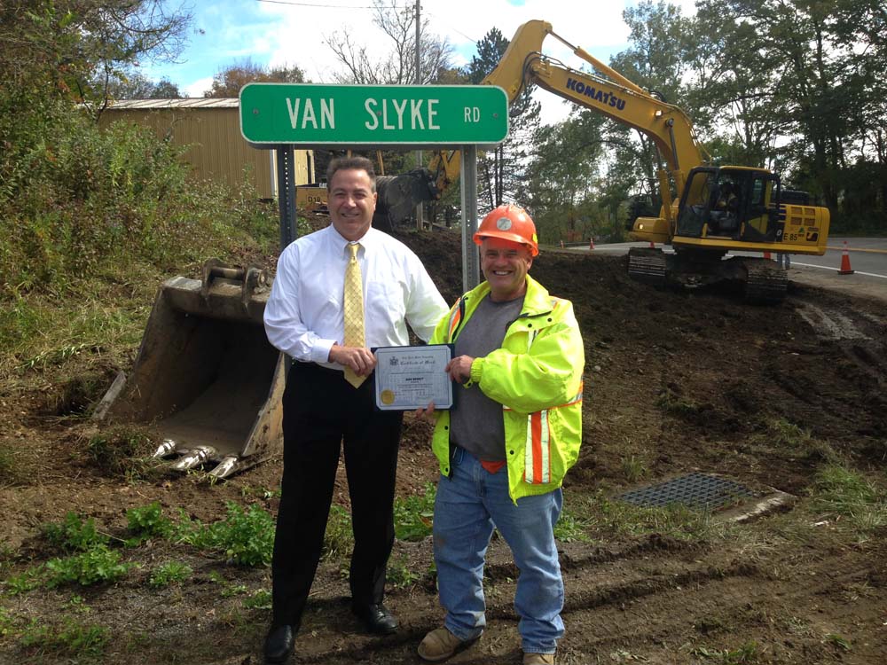 Assemblyman David DiPietro (R,C-East Aurora) is seen awarding a Citation to DOT Engineer Dan Bierut for going above and beyond the call of duty for creating a line of sight at the intersection of Rout