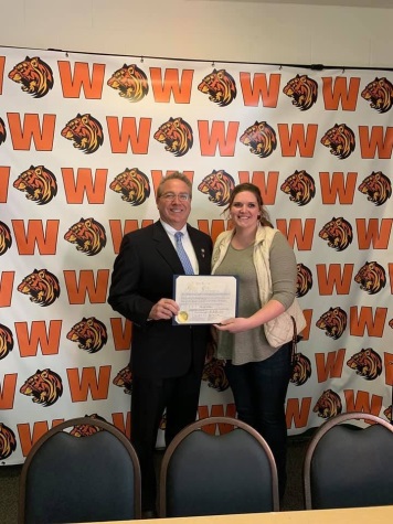 Assemblyman David DiPietro (R,C,I-East Aurora) delivering a commendation to Hannah Johnson at Warsaw High School on March 8, 2019.