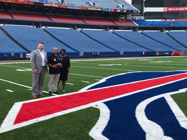 Pictured with Speaker Heastie at New Era Field is (from left to right): Assemblyman Pat Burke and Assembly Majority Leader Crystal Peoples-Stokes.