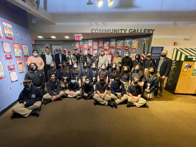 Assemblyman Ed Ra joins the 8th grade students of Notre Dame School and local veterans for the 2021 Veterans Portrait Project.